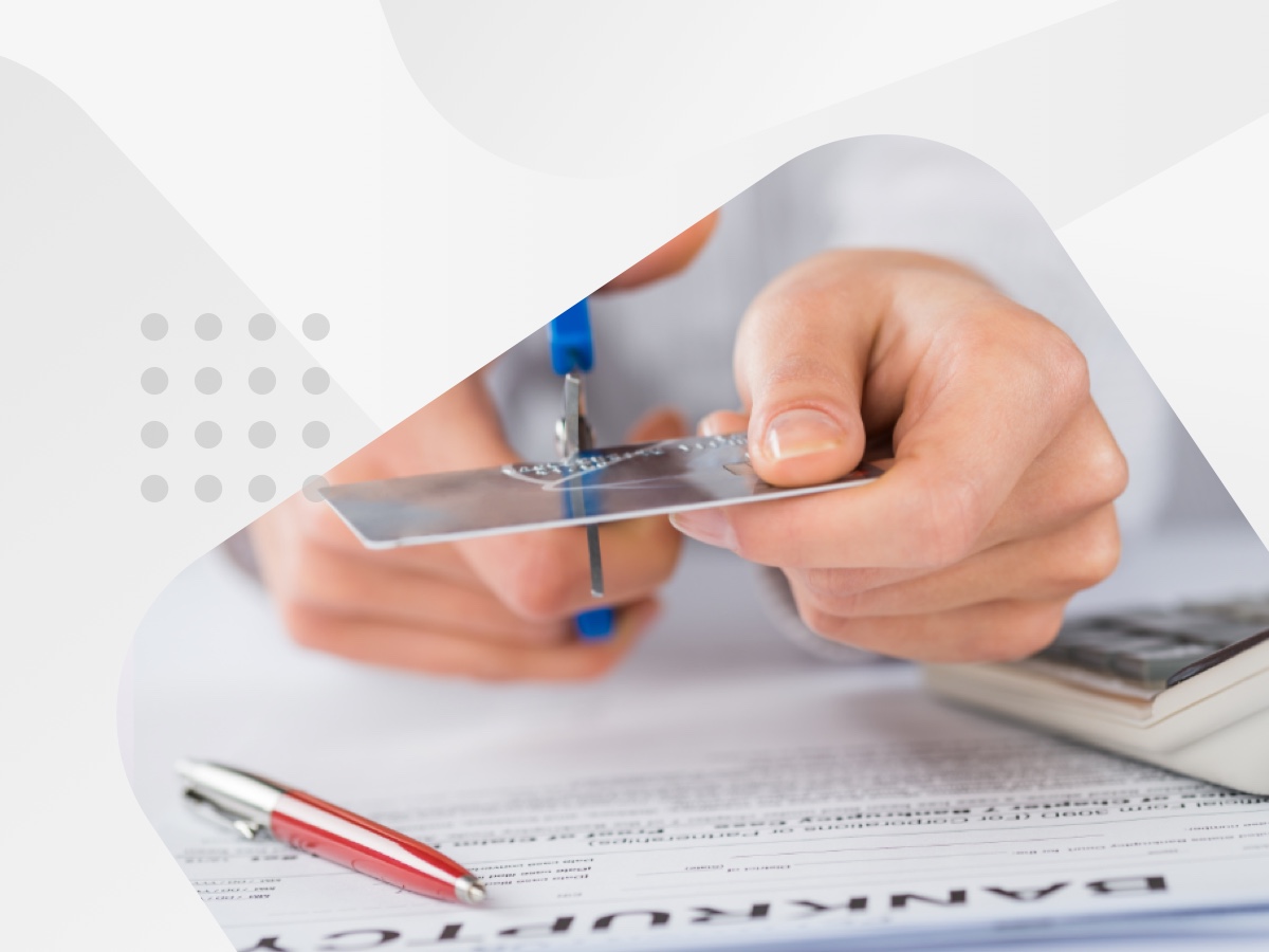 Person cutting up a credit card